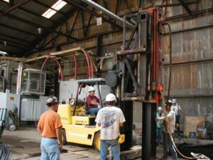 Steel H Piles | Driving Steel H Piles Inside A Building At Blue Ridge Paper Canton NC